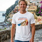 Man  a 'Positano' t-shirt with a scenic background AMALFI MAREQUI